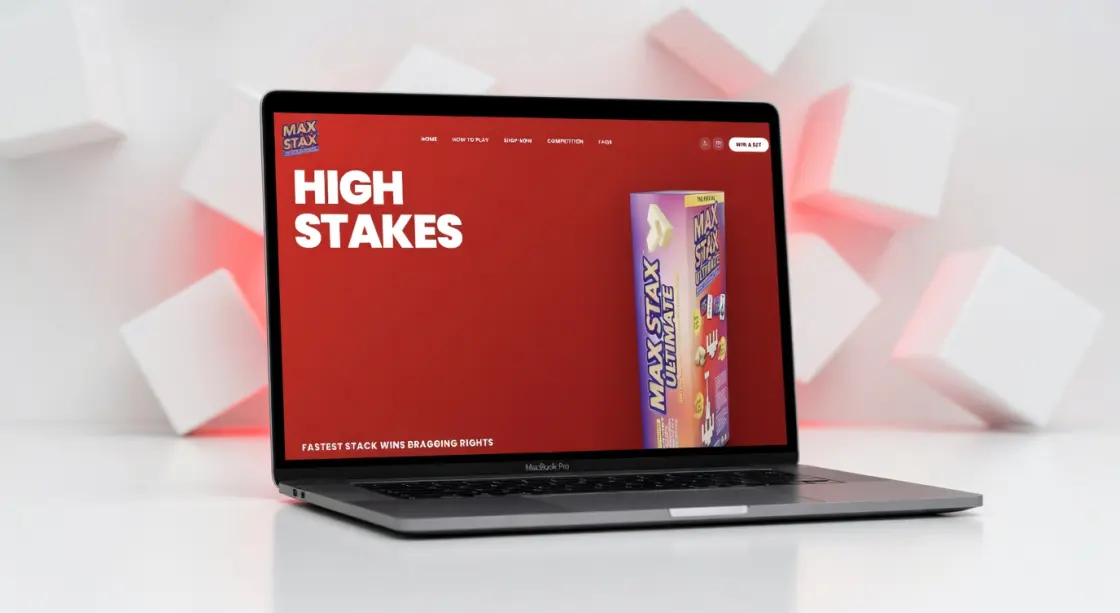 MaxStax Gaming interactive website displayed on a laptop